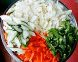A picture of step 2 of Vegetable pasta with fried fish.