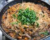 Une image de l'étape 12 de Nouilles de riz sautées aux légumes et épices.