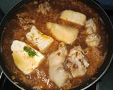 Foto langkah ke 10 dari resep Semur Tahu Ayam Pedas.