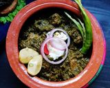 A picture of step 11 of Saag Gosht with Makkai Ki Roti.