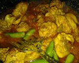 A picture of step 6 of Chicken highway karahi with rice.