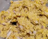 A picture of step 3 of Corn fritters in appe pan.