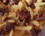 Foto del passaggio 4 della ricetta Patate gratinate al forno con salsiccia calabrese dolce