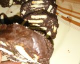 A picture of step 9 of Chocolate and biscuit salami.
