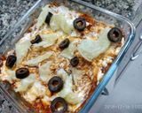 A picture of step 5 of Flattened rice creamy pizza.