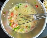 A picture of step 3 of Italian cheese and herbs omelette.