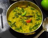 A picture of step 6 of Lasooni Dal Palak with Gondhoraj lebu/ lemon.
