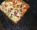 A picture of step 7 of Tawa bread pizza.