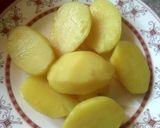 A picture of step 1 of Aloo Chokha.