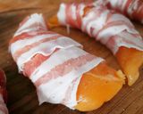 Foto del paso 1 de la receta Solomillos de pollo albardados en salsa de champiñones