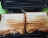 A picture of step 3 of Cheese spread bread toast.