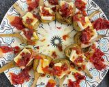 Foto del paso 4 de la receta: Alcachofas confitadas con brie y crujiente de jamón ibérico