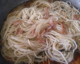 A picture of step 4 of Bacon and egg spaghetti.