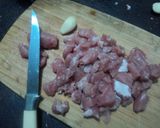 A picture of step 1 of Pork in Milpa Tomato Sauce with Green Chiles and Epazote.