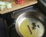 A picture of step 3 of Tomato rice with chicken and salad.