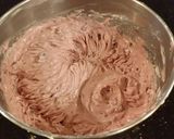 A picture of step 12 of Chocolate Layer Cake with Cherry Cheesecake Filling and Frosting.