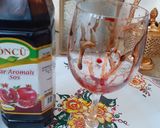 A picture of step 1 of Pomegranate spritzer alcohol free.