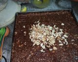 A picture of step 24 of Dodha Burfi with Daliya.
