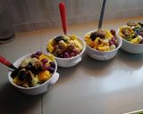 A picture of step 4 of #endyearchallenge mixed fruit salaad different nuts.