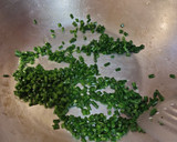 A picture of step 1 of Eggs with Chives.