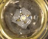 A picture of step 2 of Oreo milk shake.