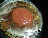 A picture of step 5 of Spicy wings with sauce.