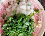 A picture of step 2 of Radish leaves sabzi, tomato arhar dal,rice & roti.