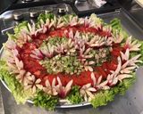 Une image de l'étape 9 de Salade de tomates,scarole,céleri et thon aux radis « fleurs ».