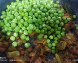 A picture of step 5 of Matar Pulao.