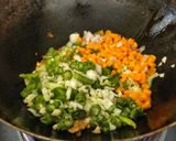 A picture of step 3 of Triple Schezwan fried rice.