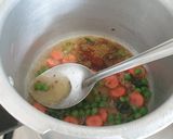 A picture of step 2 of Daliya Khichdi.