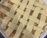A picture of step 9 of Apple pie with flaky butter crust served with vanilla ice cream.