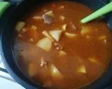 Foto del paso 6 de la receta: Patatas con carne en salsa con picada de frutos secos