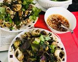 Hình bước làm 4 của món Ốc hương xào tỏi ớt lá quế