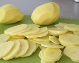 Foto del paso 1 de la receta: Alitas de pollo con patatas al horno