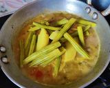 A picture of step 8 of Chhuin aloo tarkari (Drumstick curry).