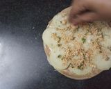 A picture of step 5 of Sandwich pizza from leftover Roti.