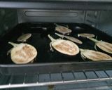 A picture of step 1 of Baingan Masala (Baked Aubergines).