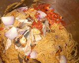 A picture of step 3 of Stir fried pasta with smoked fish.