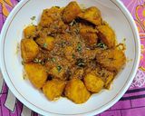 A picture of step 7 of Masala baby potatoes.
