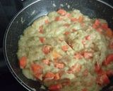 Foto del paso 4 de la receta Calabacín relleno de zanahorias y nueces con arroz salteado con pasas y caqui