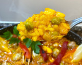Foto del paso 10 de la receta: “ Arroz meloso” con anillas de pota