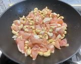 A picture of step 13 of Chicken with Cashews, Bell Peppers, and Carrots.