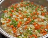 Foto del paso 3 de la receta: Arroz con pota y salmón