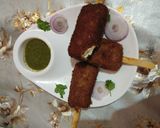 A picture of step 6 of Chicken lollipops.