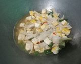Foto langkah ke 4 dari resep Tumis Jamur Tiram Tahu Kuning.