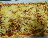 Foto del paso 7 de la receta Pizza de salsa de tomate con carne