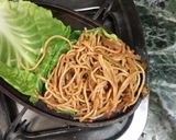 A picture of step 8 of Veg sizzler of sehezwan hakka noodles with sauteed vegetable.