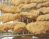 A picture of step 6 of Parmesan and Panko Baked Chicken Tenders.