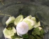 A picture of step 2 of Cucumber Mint mojito.